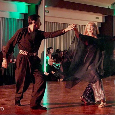 Monica Romero and Omar Ocampo performing an expressive, high-energy Argentine Tango embrace